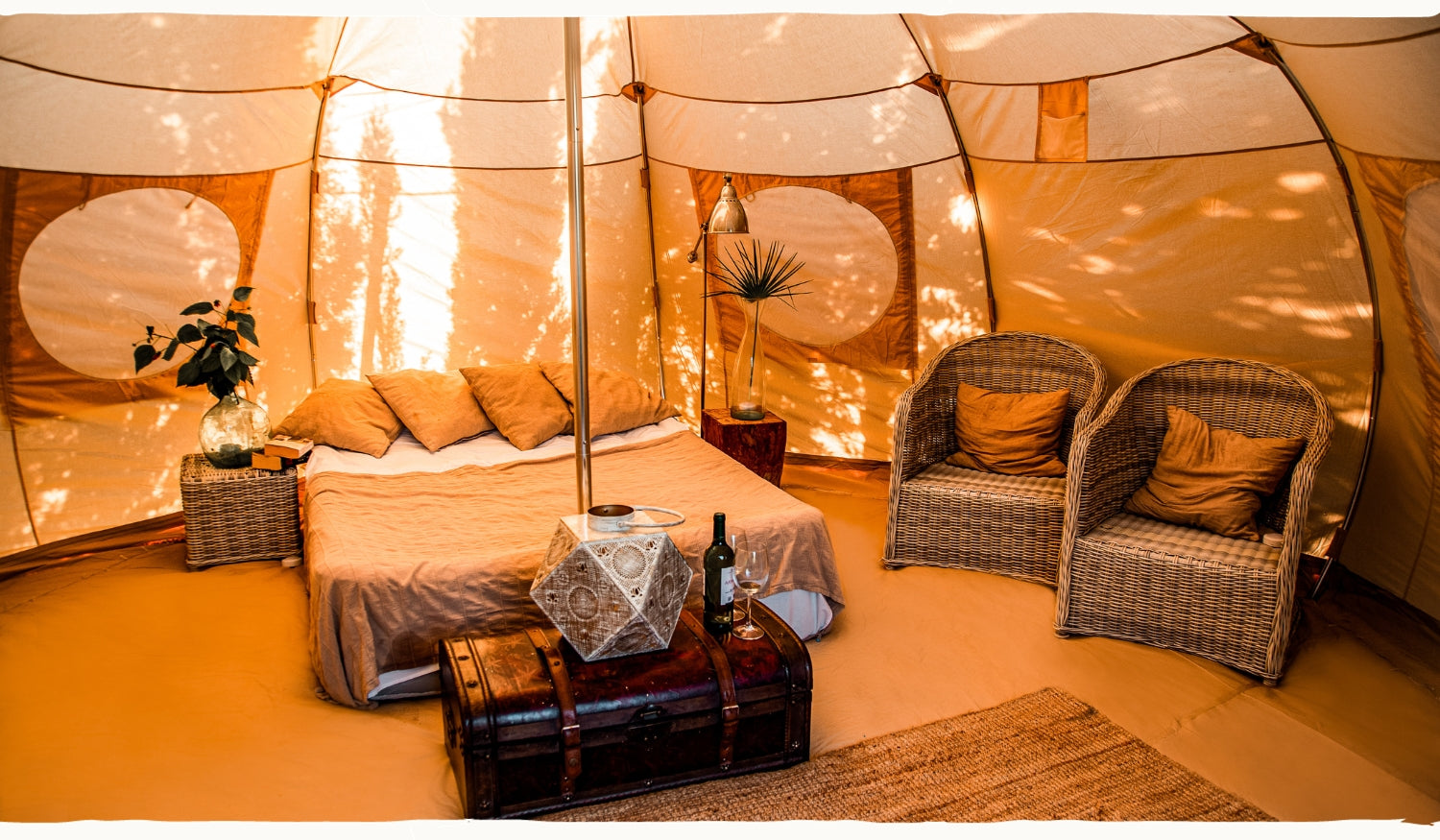 romantic boho tent interior with double bed of luna yurt bell tent